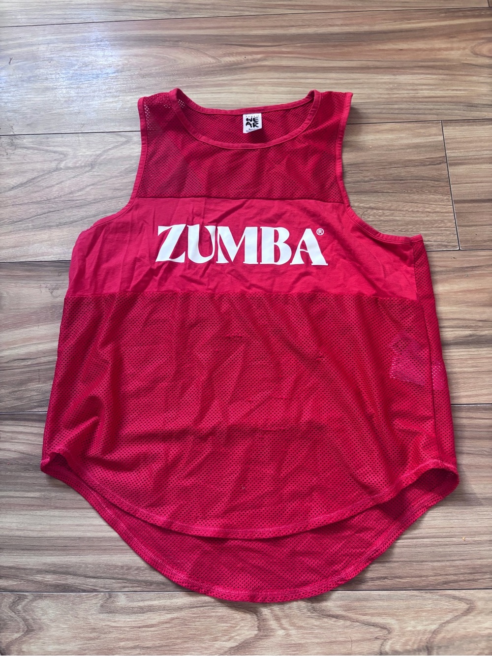 Red Zumba tank top with white 'ZUMBA' text size Small S
